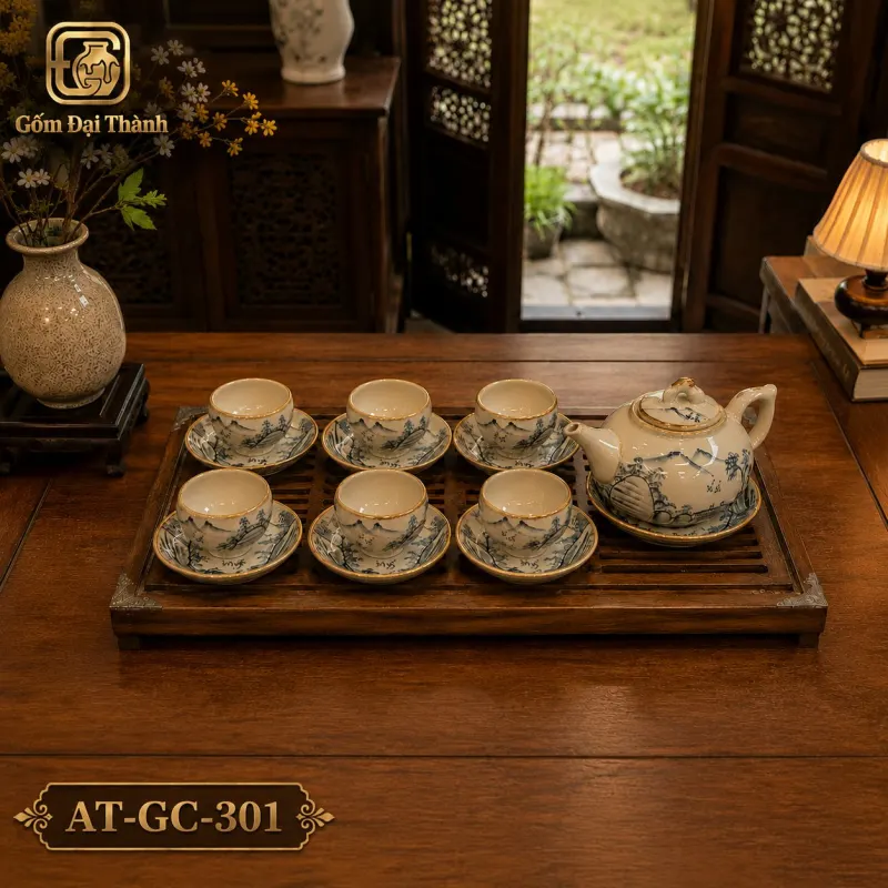 Bộ ấm chén hồng sơn thủy ba chân giả cô